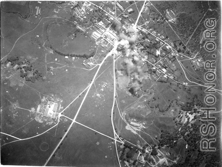 Bombing of small crossroads town, either in Burma or French Indochina. During WWII.