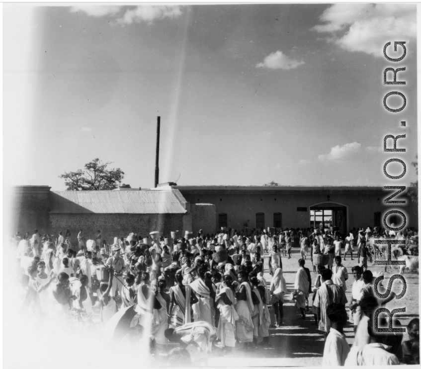 Market scene.  Scenes in India witnessed by American GIs during WWII. For many Americans of that era, with their limited experience traveling, the everyday sights and sounds overseas were new, intriguing, and photo worthy.