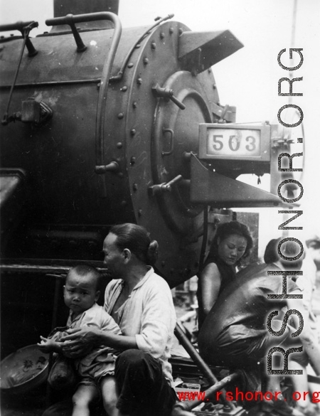 Chinese civilian evacuation in Guangxi province, China, during WWII, during the summer or fall of 1944 as the Japanese swept through as part of the large Ichigo push.