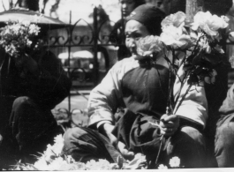 Am elderly flower vendor in Kunming during WWII.