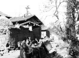 Local people in China: A horse or mule carries baskets around a village in Yunnan Province.