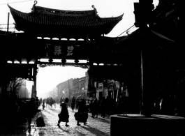 "Emerald Chicken Archway" 碧鸡坊 in Kunming during WWII.  Local people in Yunnan province, China, in Kunming city. In the CBI during WWII.