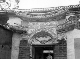 Ornate door, especially characteristic of some areas in Yunnan, Yunnan province, China. Door to a compound appropriated by Nationalist soldiers. During WWII.