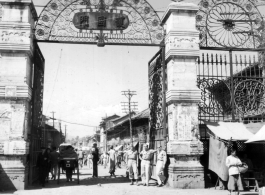 GIs pose at Huguomen gate (护国门) in Kunming, China, during WWII.