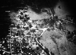 Bombing of small crossroads town in a region of savanna, either in Burma or French Indochina. During WWII.