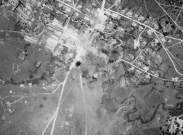 Bombing of small crossroads town, either in Burma or French Indochina. During WWII.