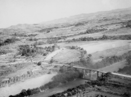Bombing of small road bridge in either SW China (esp. Guangxi), or Burma, or French Indochina during WWII.