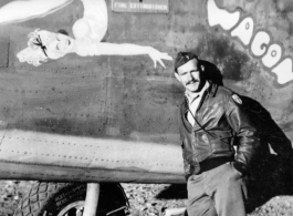 Flyer Edward D. (Don) Smith, squadron navigator, stands before F-7A/B-24 "My Assam Wagon." He went on to serve almost 30 years, retiring as LTC, and passed away in 2014 at the age of 97.  24th Combat Mapping Squadron, 8th Photo Reconnaissance Group, 10th Air Force.  (Thanks to son F. Smith for additional info!)
