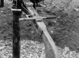 A mounted custom machine gun, with two barrels. In the CBI during WWII.