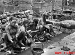 Women washing clothes in Yunnan province, China, during WWII.