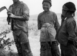 Local people in China: Villages work fields near Yangkai, Yunnan, China, during WWII.