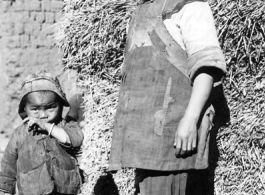 Local people in China: A woman and child near Yangkai, Yunnan, China, during WWII.