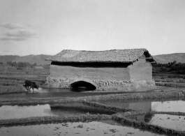 A mill house or similar in the countryside in Yunnan province, China, during WWII.  From the collection of Eugene T. Wozniak.