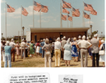 US flags wave at a modern memorial service at Liberty Park, conducted by CBIVA national chaplain, the Rev. Edward Glavin.  Photo from Neil L. Maurer.