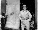 A VIP steps out of a converted B-24 to C-87 aircraft in the CBI during WWII.  Photo from Robert Lichty.