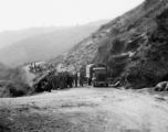 Rest break on the Burma Road, possibly to gawk at a crash or some curiosity. During WWII.