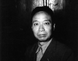 KMT civilian official at rally poses for portrait shot. This should be An Zefa (安则法), a highly educated official who had a number of roles in Yunnan during WWII.