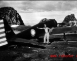 GI poses with an airplane with nationalist markings at Liuzhou base, Guangxi province.
