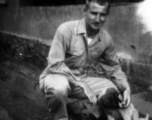Robert Fox and puppy in the CBI, most likely at Yangkai.