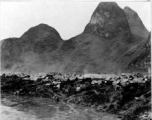 The town of Chin Chen Chiang with the straw huts. When the Japanese captured this city they burned these houses, causing one of the largest fires ever seen in China.
