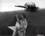 Bullet holes in the fuselage of the North American B-25 after a mission that ended in a forced landing on one wheel at its base in China.  December 12, 1942.