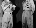 Two American US Army Air Force flyers chat in the CBI during WWII.