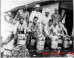 GIs hand-crank barrels of ice cream in the CBI during WWII.